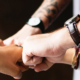 five fists touching