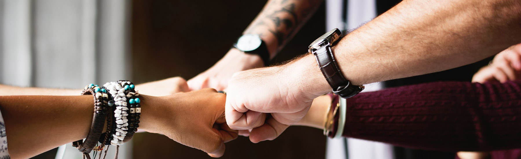 team-fpo five fists touching