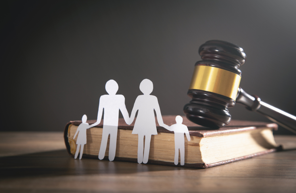 Paper cut family, judge gavel and book. Family Law Paper cut family, judge gavel and book. Family Law